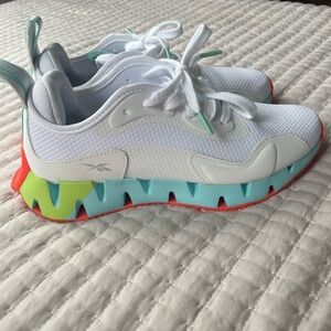 Reebok White and Blue Sneakers with Modern Design